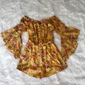 Floral romper, size M.